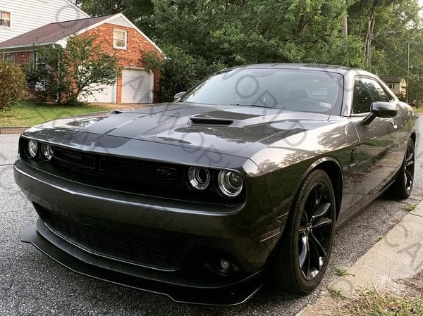 Matte black Challenger front lip splitter installed on Dodge Challenger 2015–2023 R/T showing full vehicle front view with aggressive styling and precise fitment