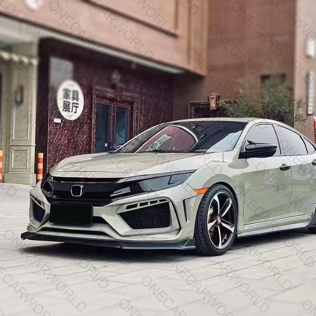 Modified Honda Civic featuring a sleek RS style front bumper, professionally painted, parked outside