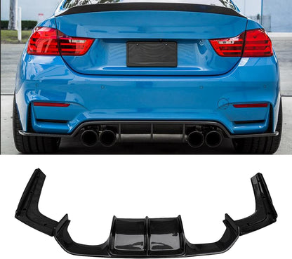 Gloss black rear diffuser with lip kit installed on BMW F80 M3 / F82 F83 M4 2015–2020, enhancing aerodynamics and sporty rear design.